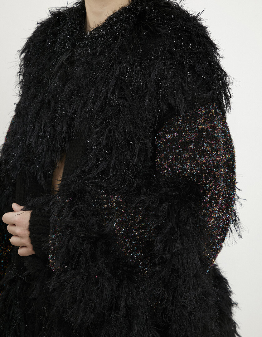 Hand-knit black fringed cardigan